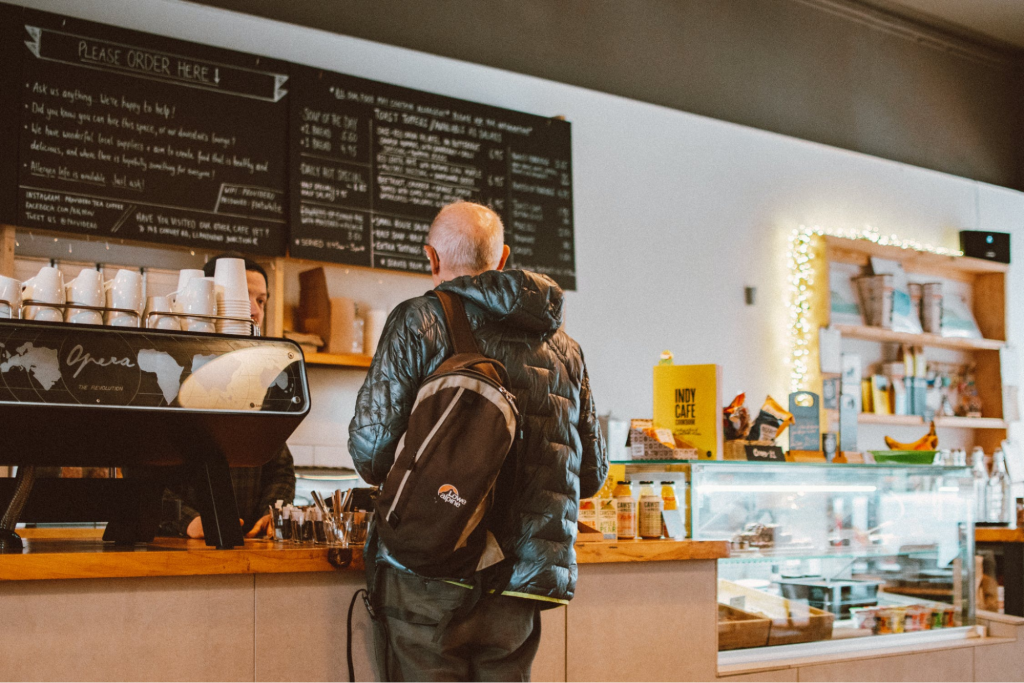 man ordering at a coffee shop