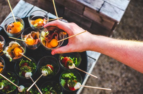 What is the role of caterers for hosting successful parties and events?