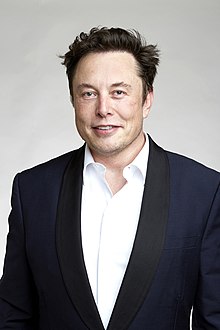elon musk in blue suit
