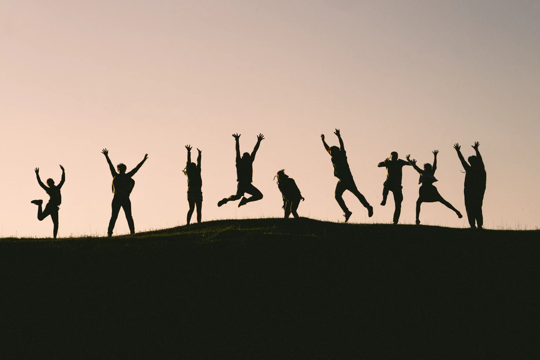 Coworkers celebrating the importance of teamwork