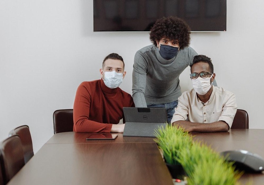 How can businesses protect their workplace from the latest Omicron surge?