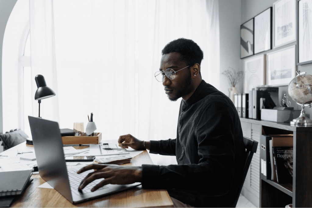 Man working to manage payroll