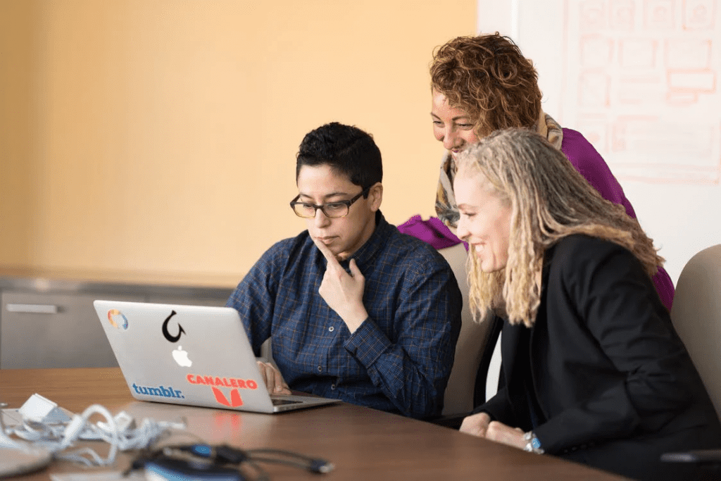 Employees learning a new Payroll Software
