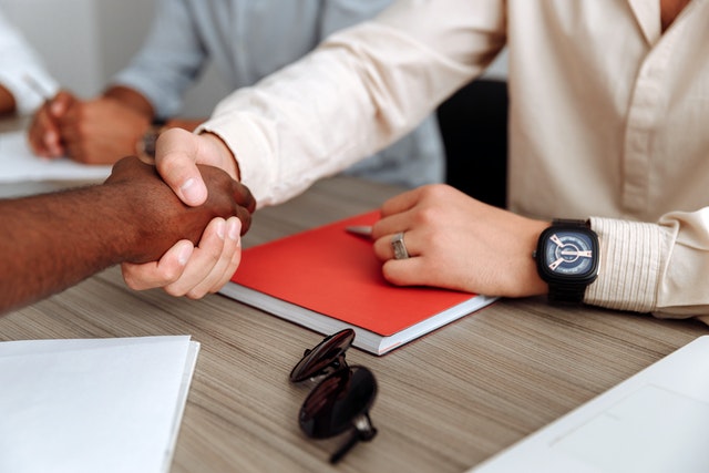 Man congratulating its client for setting up a limited company