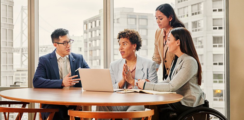 Group having a meeting at a table