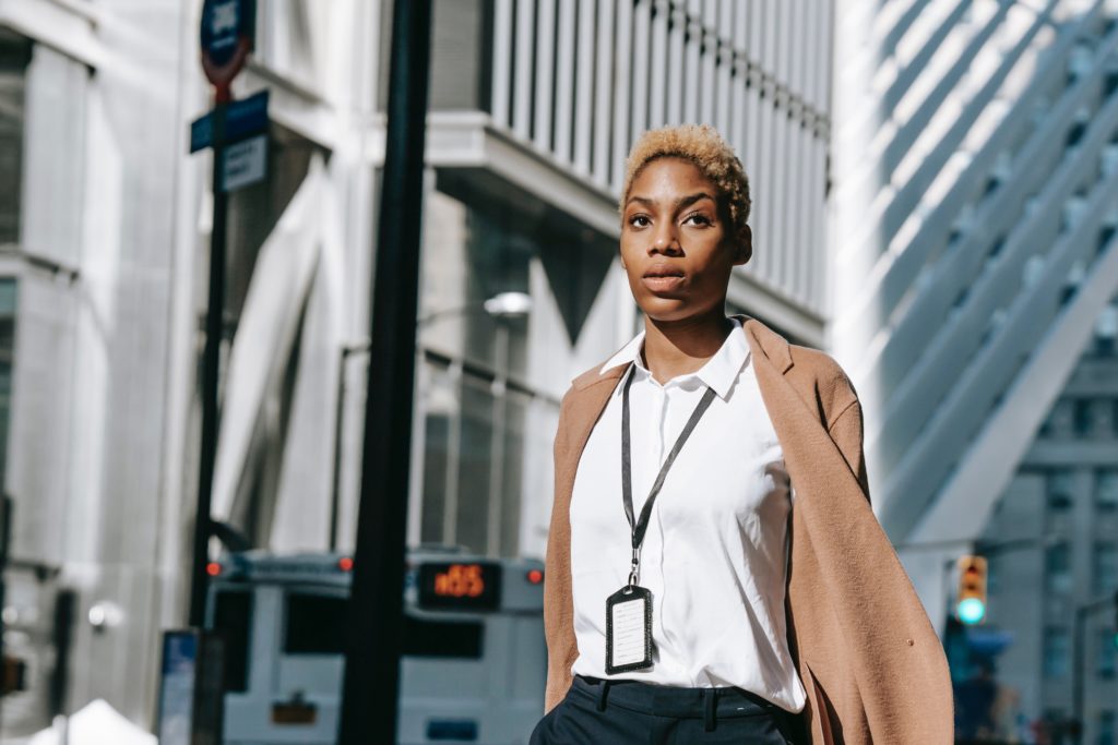 A  modern woman CEO walking on the streets.