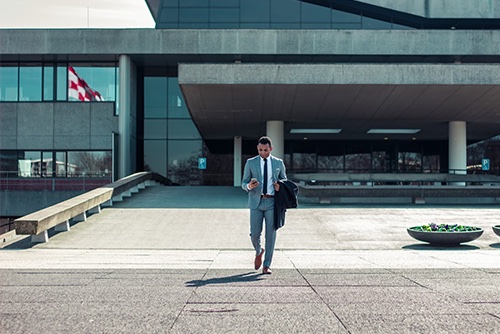 FLSA Exempt employee walking out of a building