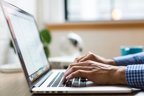 Person working on timesheets