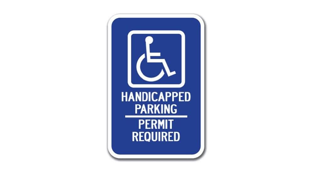 Handicapped Symbol with Handicapped Parking Permit Required Sign