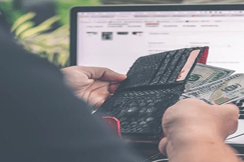 Employee counting out her supplemental wages