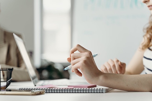 Woman seeing the benefits of a corrective action plan