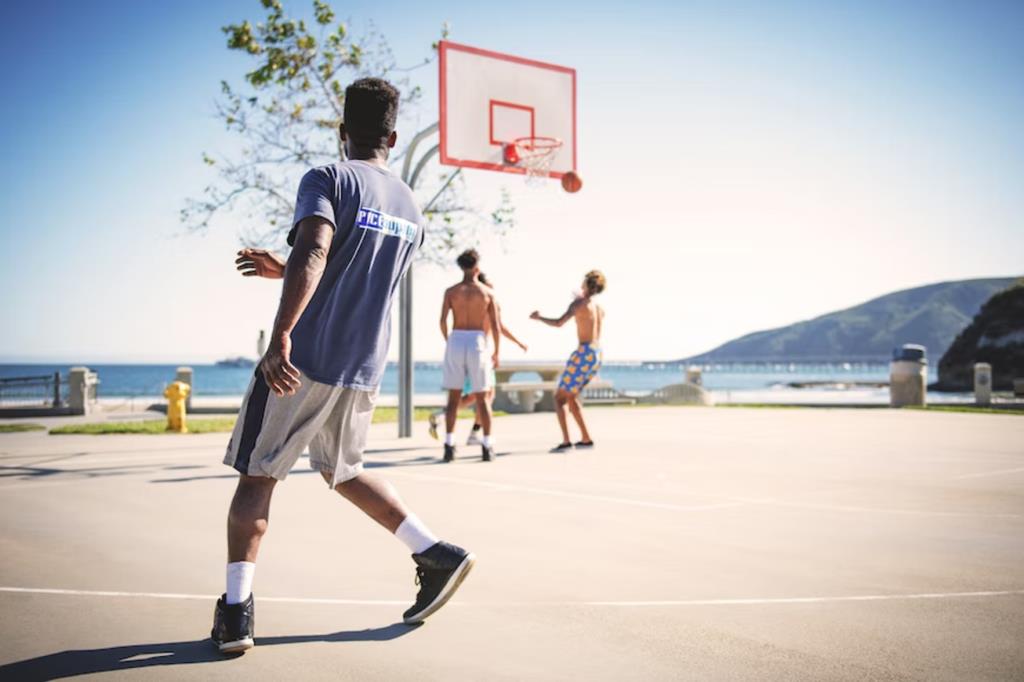 Man playing basket ball.