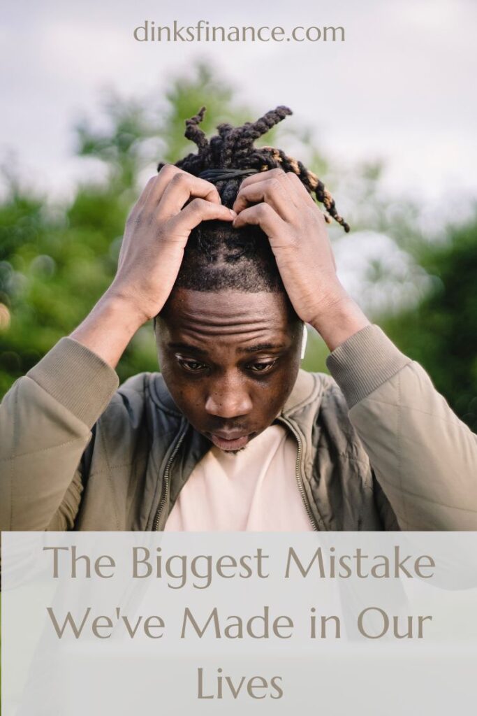 Man holding his head with his hands. He looks perplexed.