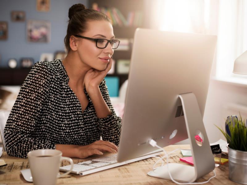 How to find a hashtag - woman searching on a mac