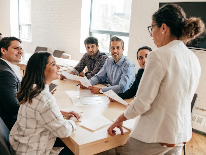 small business loans for minority women team meeting