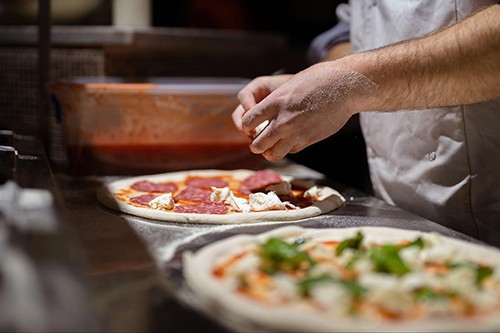 Pizza being made