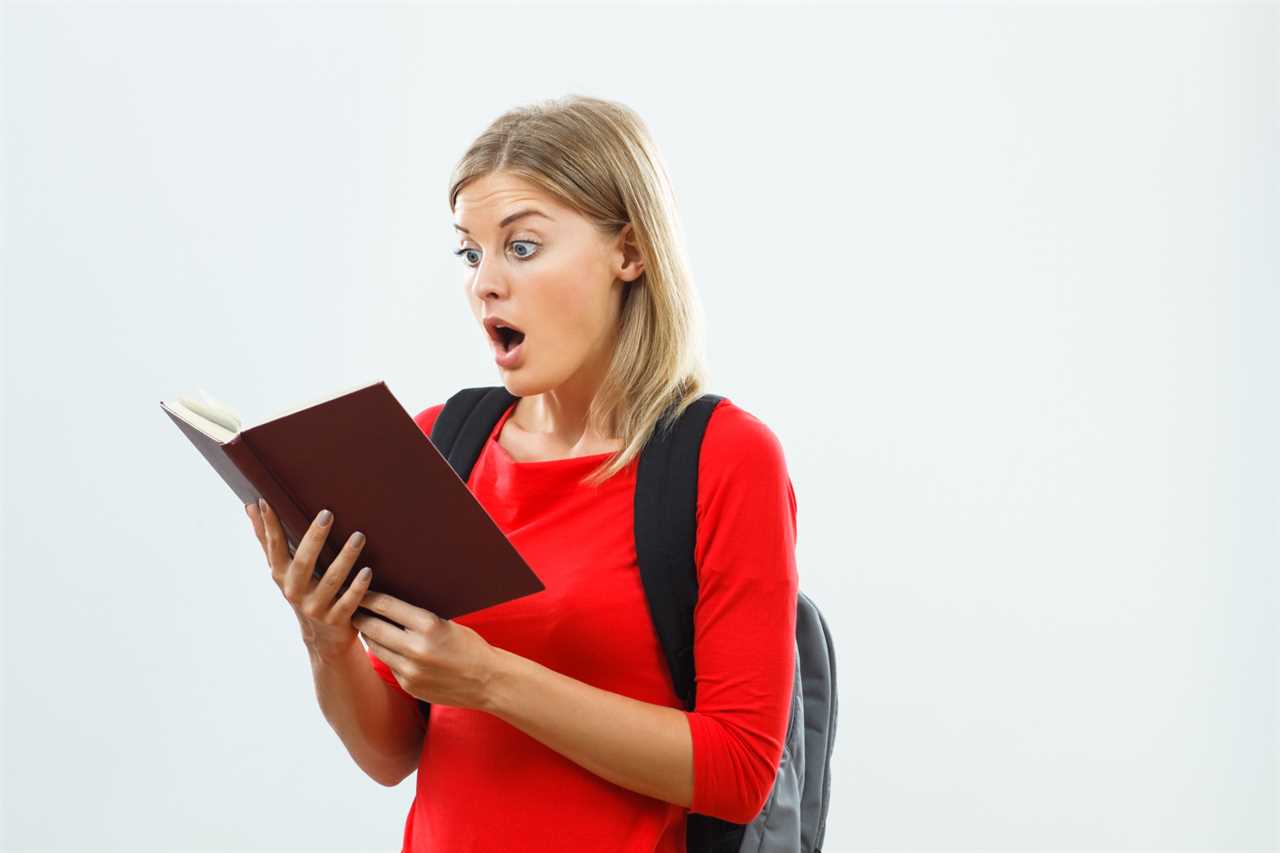 shocked woman reading history book